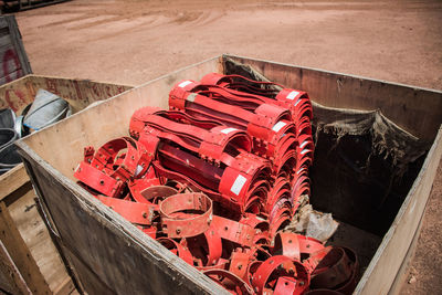 High angle view of metal parts in container outdoors