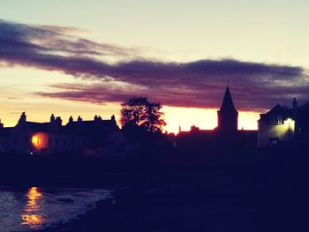 Silhouette of buildings at sunset