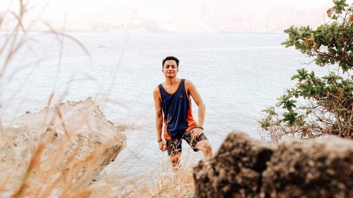 Portrait of a young man on beach