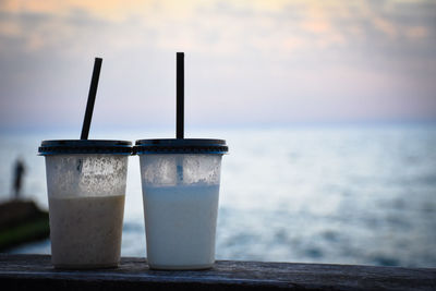 Close-up of drinks against blurred background