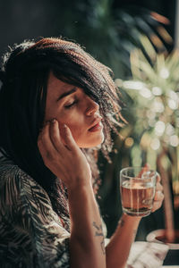 Portrait of a woman drinking glass