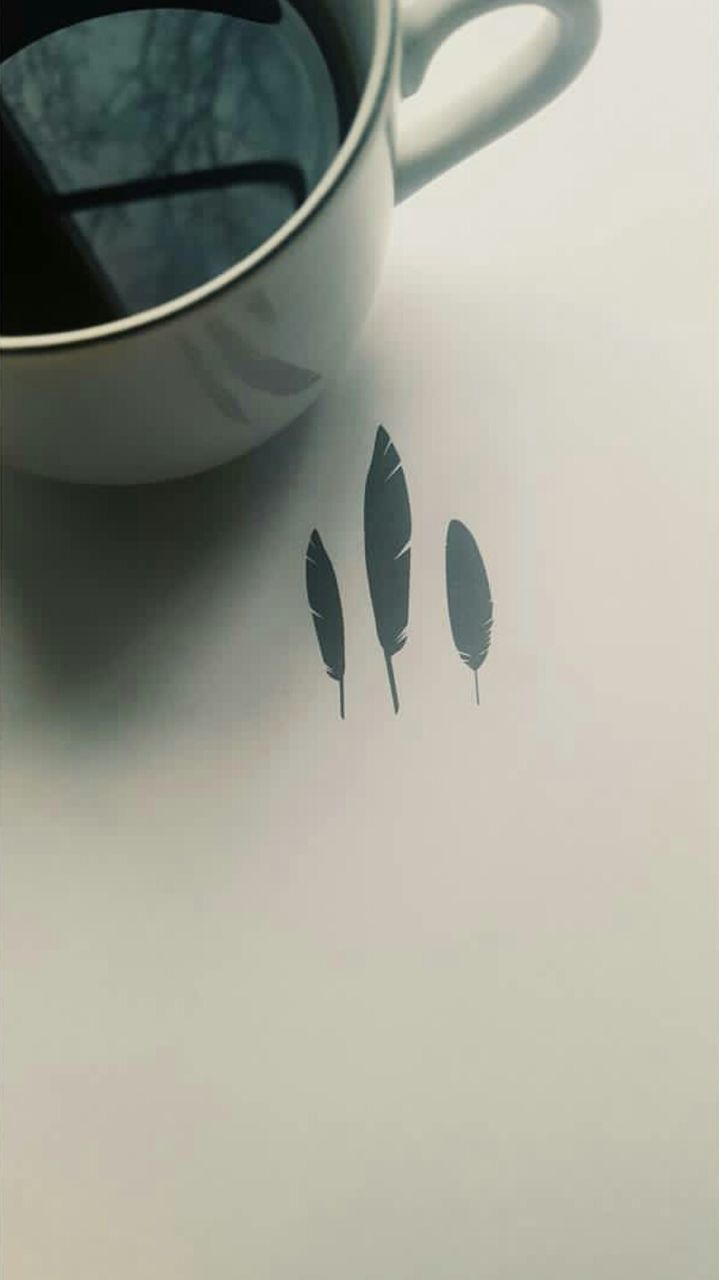 HIGH ANGLE VIEW OF COFFEE ON TABLE
