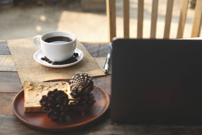 Coffee cup on table