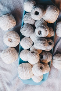 Close-up of thread rolls