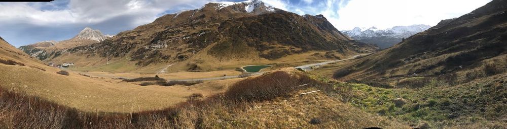 Panoramic view of landscape and mountains against sky