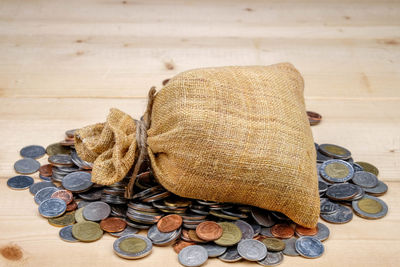 High angle view of coins on table