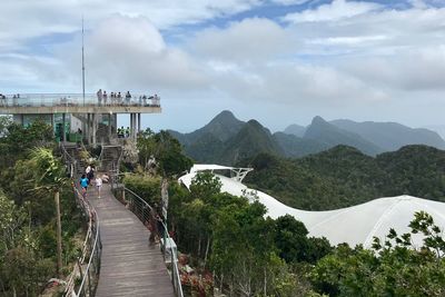 Panoramic view of bridge over mountains against sky