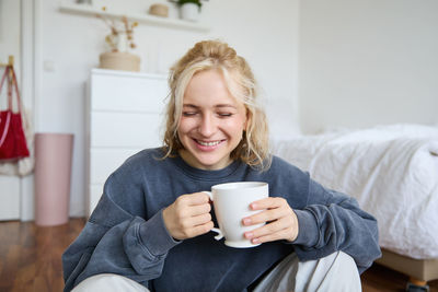 Young woman using mobile phone