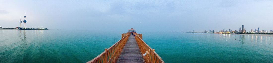 Panoramic view of pier on sea