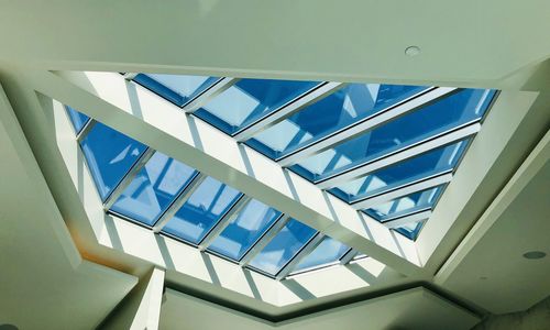 Low angle view of skylight in building