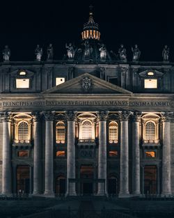 Facade of historic building at night
