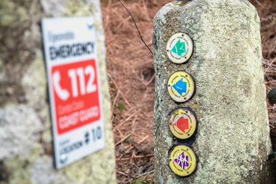 Close-up of text on rock