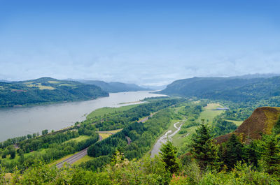 High angle view of mountains by sea