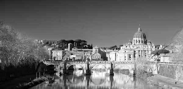 The river tiber with historic building reflecting in the calm water