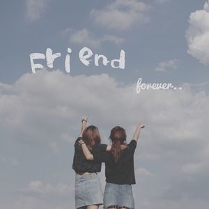 Friends standing with text against sky