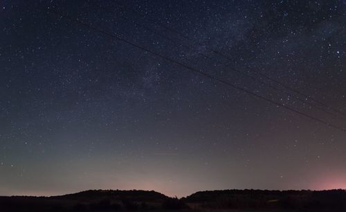 Low angle view of stars in sky at night