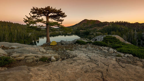 Scenic view of lake against sky during sunset