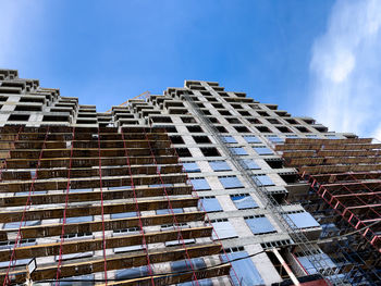 Low angle view of modern building against sky