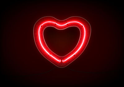 Close-up of heart shape against black background