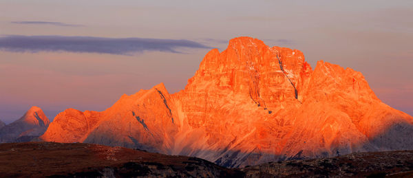 Scenic view of mountain against sky during sunset