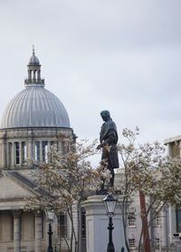 Low angle view of statue against clear sky