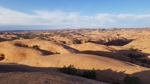 Scenic view of desert against sky