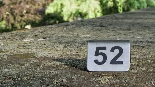 Close-up of information sign