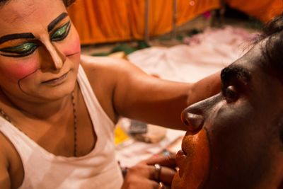 Artists doing make-up during ramlila