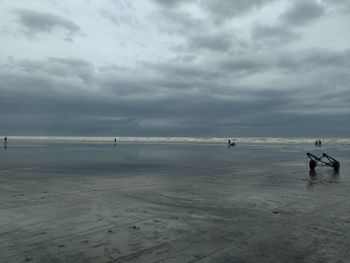 Scenic view of beach against sky