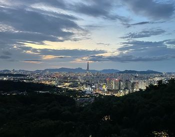 High angle view of city buildings during sunset