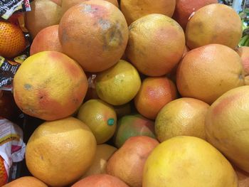 Full frame shot of oranges at market stall