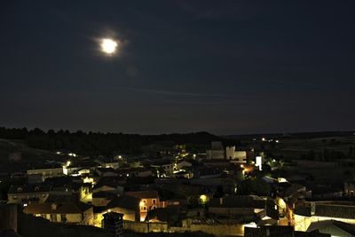 Illuminated cityscape at night