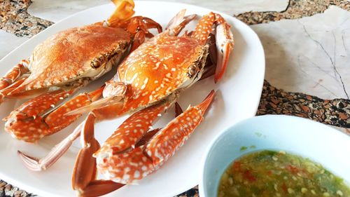 High angle view of seafood in plate on table