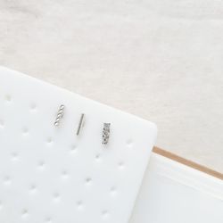 High angle view of white buttons on table