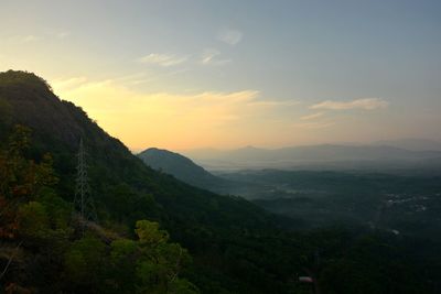 Scenic view of mountains against sky during sunset