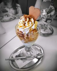 Close-up of ice cream in glass on table