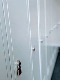 Close-up of electric lamp on wall