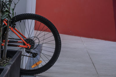 High angle view of bicycle wheel by road