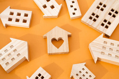 Many miniature wooden houses. real estate concept. choose affordable housing