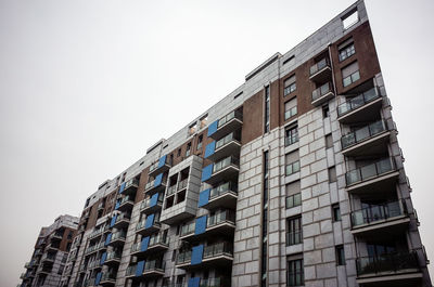 Low angle view of residential building against sky
