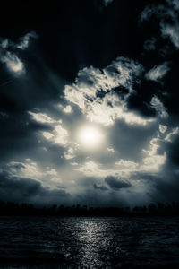 Scenic view of sea against sky at night