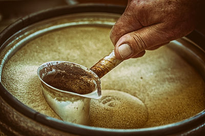 Close-up of person preparing food