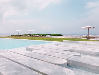 Scenic view of infinity pool against sky