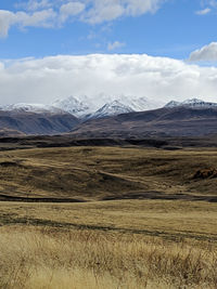 Scenic view of snowcapped mountains against sky, in new zealand. 