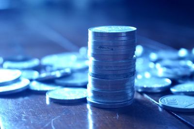Close-up of coins on table