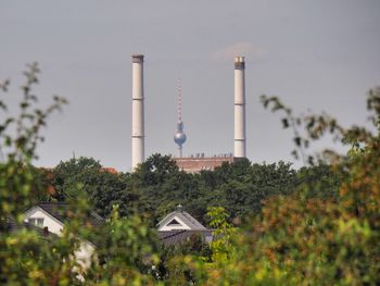 View of factory against sky