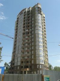 Low angle view of modern building against sky