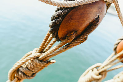 Close-up of sailboat on sea