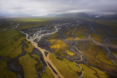 Aerial shot of meandering glacier rivers in south iceland