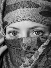 Close-up portrait of  girl covering face